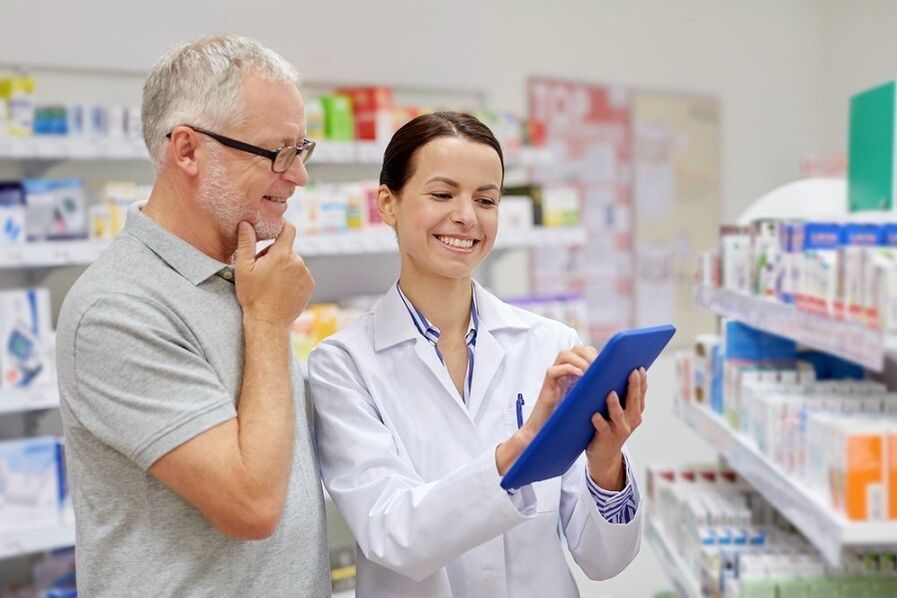 The doctor prescribes a man medicine for parasites